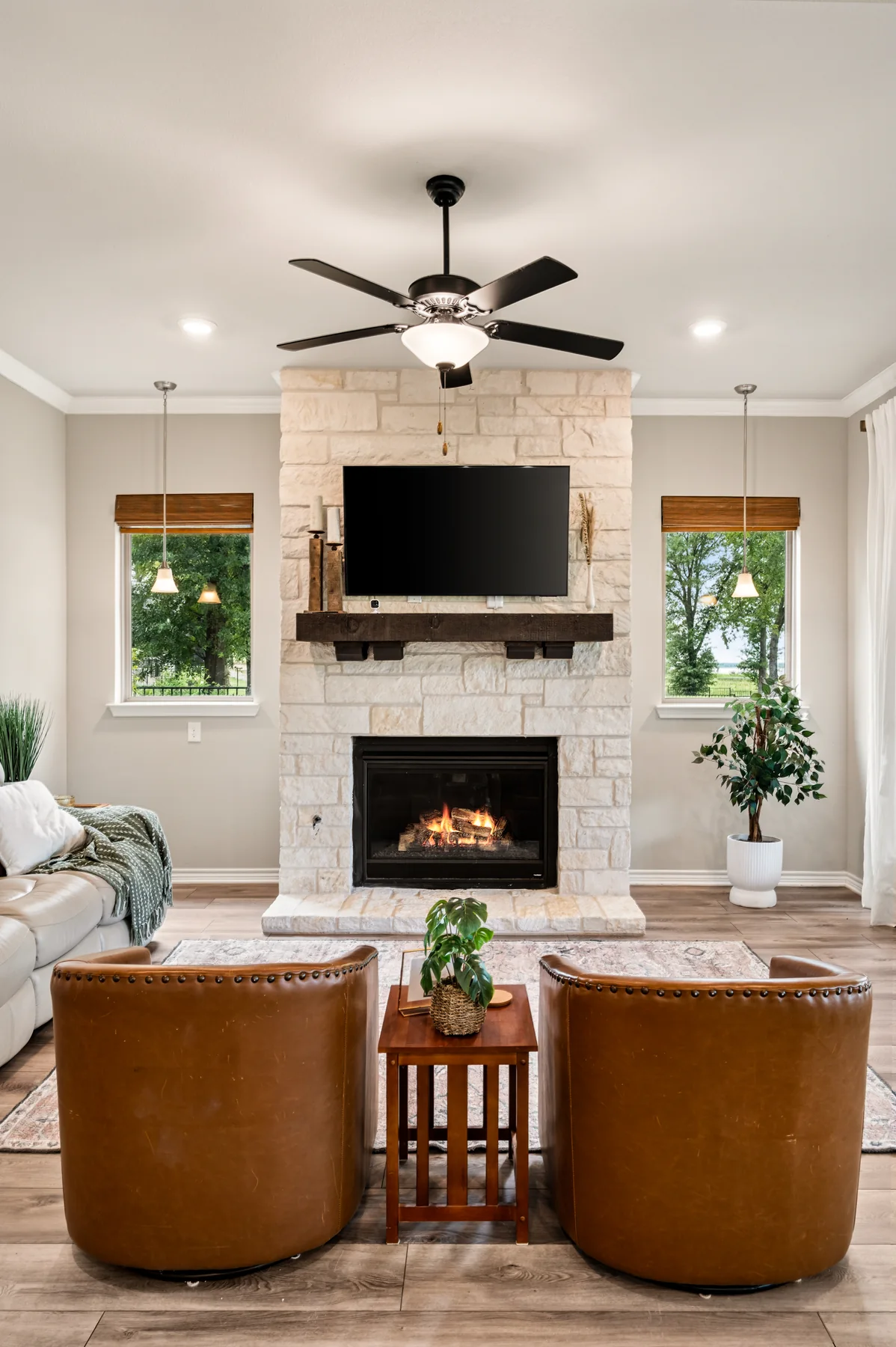 Living room with stone fireplace