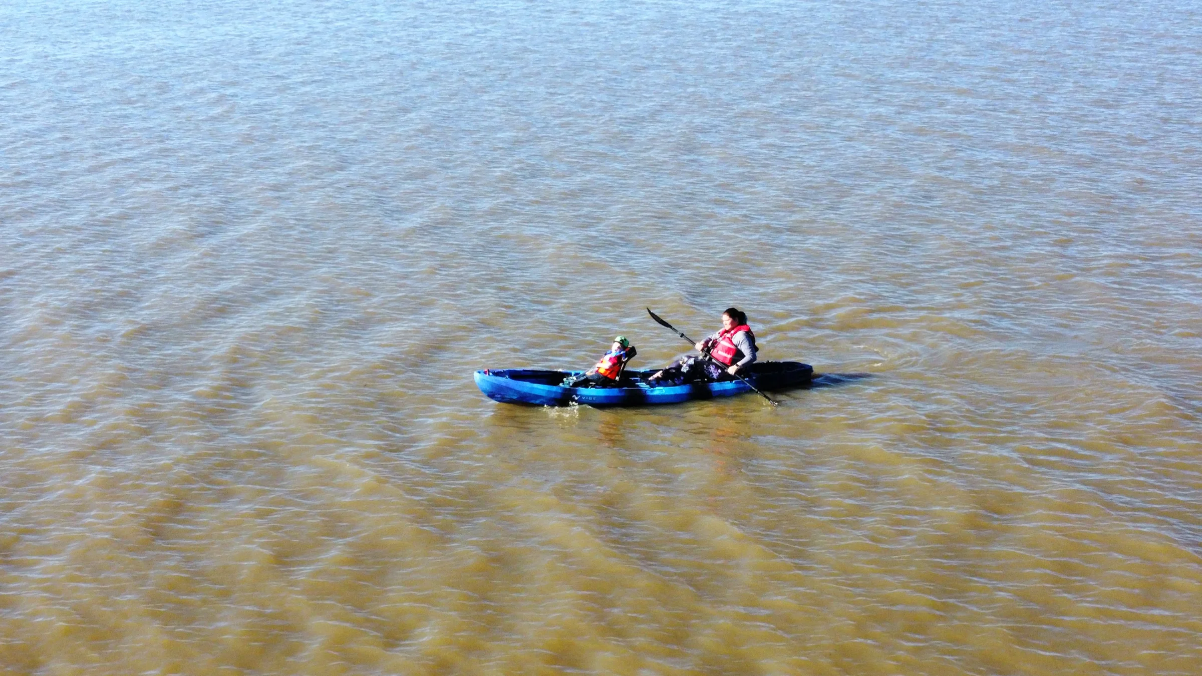 Wide aerial view of activity on Cedar Creek Lake